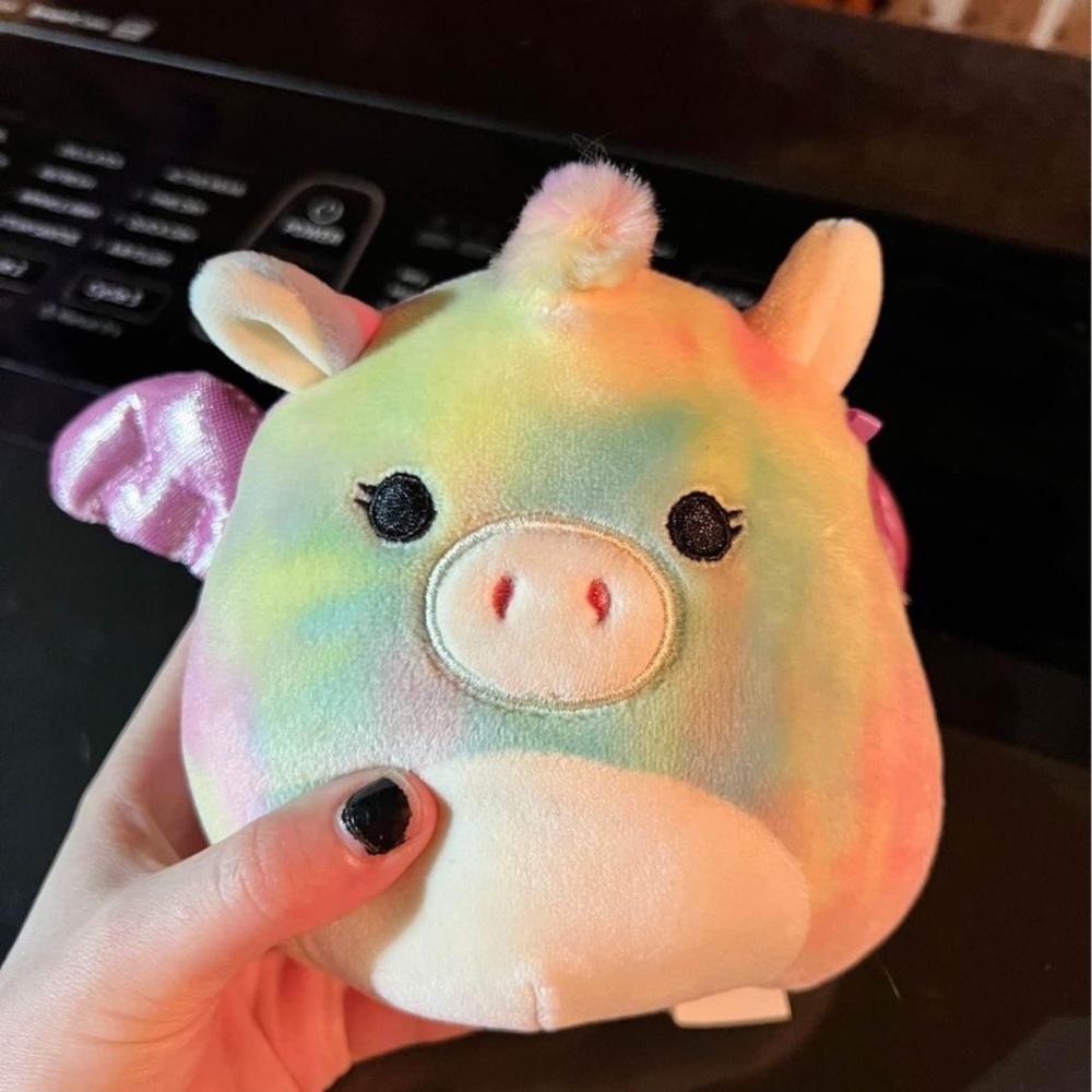 Multi color Dino squishmallow